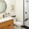 Large well it bathroom with brown cabinets and white countertops 